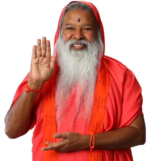 Sri Swamiji smiling with his hand raised in blessing